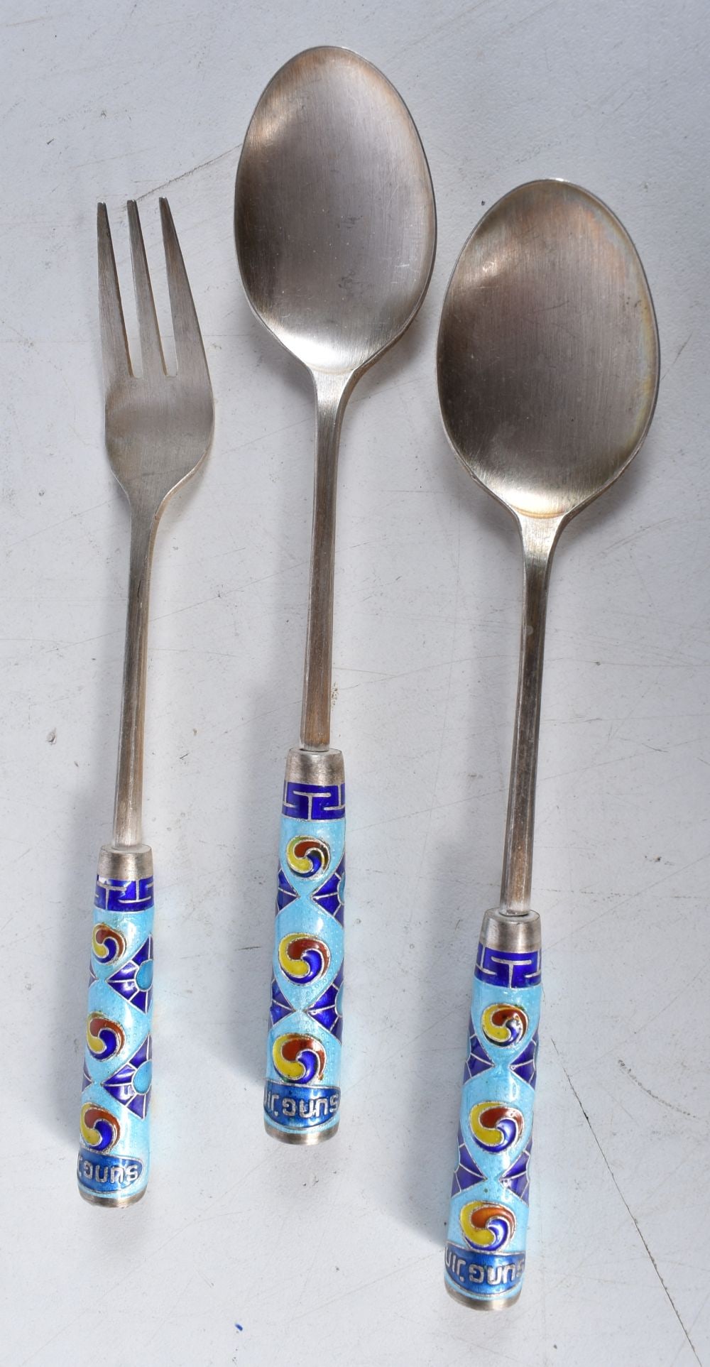 A collection of SOUTHEAST Asian cutlery with enamelled handles 14 cm (3): A collection of SOUTHEAST Asian cutlery with enamelled handles 14 cm (3)