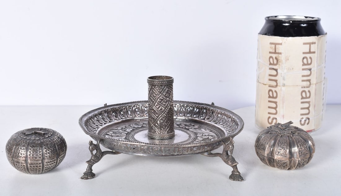 A Central Asian white metal embossed candlestick holder together with two small white metal Indian l (1 of 5)