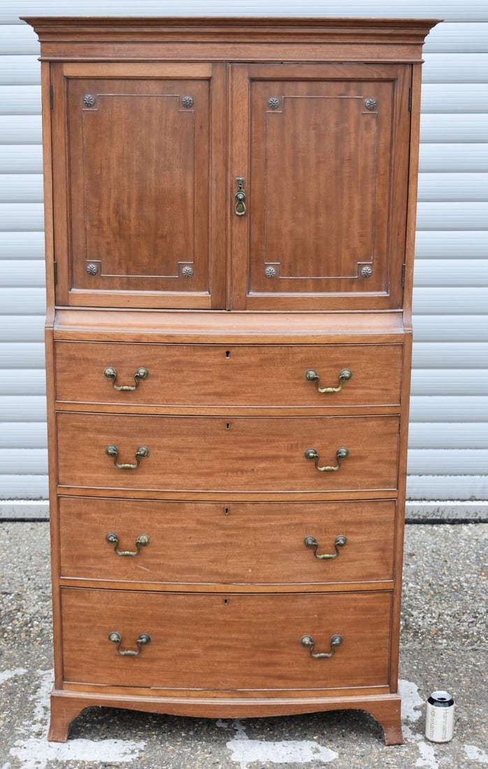 An antique Hampton & Sons, Pall mall linen press with 4 bow fronted drawers 172 x 84 x 40 cm.: An antique Hampton & Sons, Pall mall linen press with 4 bow fronted drawers 172 x 84 x 40 cm.