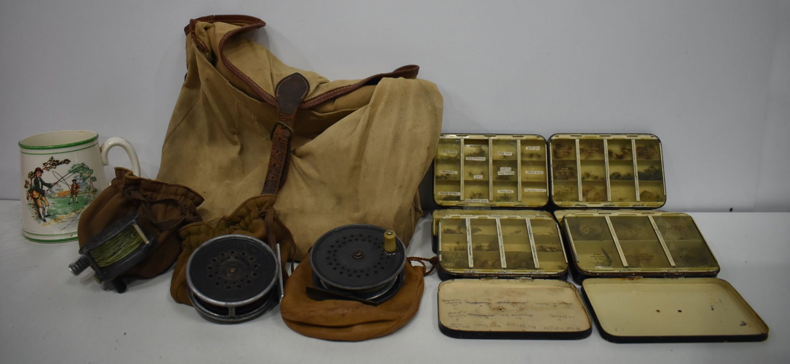 A collection of vintage fly fishing equipment, Hardy reels, boxed fishing flys, bags,fishing related (1 of 4)