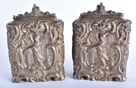 A FINE PAIR OF GEORGE III SILVER CHINOISERIE TEA CADDIES by Thomas Pitts I, After Paul De Lamerie, d: A FINE PAIR OF GEORGE III SILVER CHINOISERIE TEA CADDIES by Thomas Pitts I, After Paul De Lamerie, decorated in relief with figures picking fruit, within beautiful rococo banded panels. 921 grams. Lon