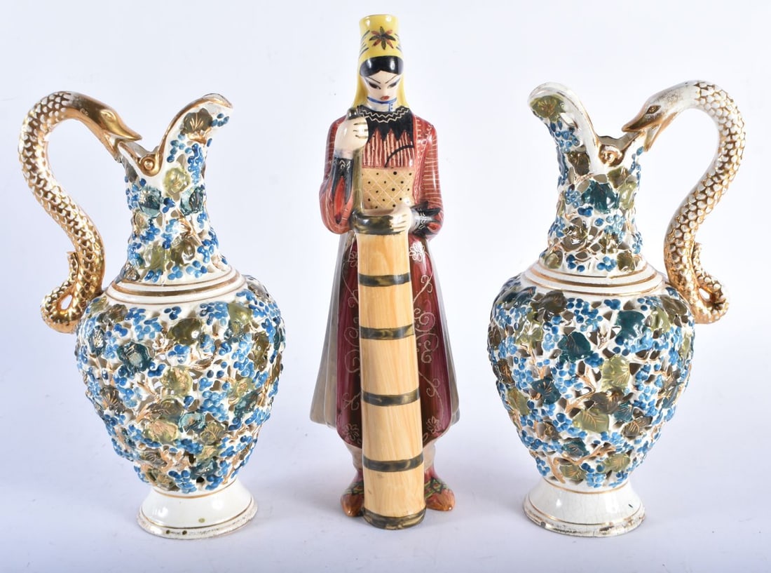A PAIR OF HUNGARIAN FISCHER RETICULATED POTTERY EWERS together with another vintage ceramic figure. (1 of 8)