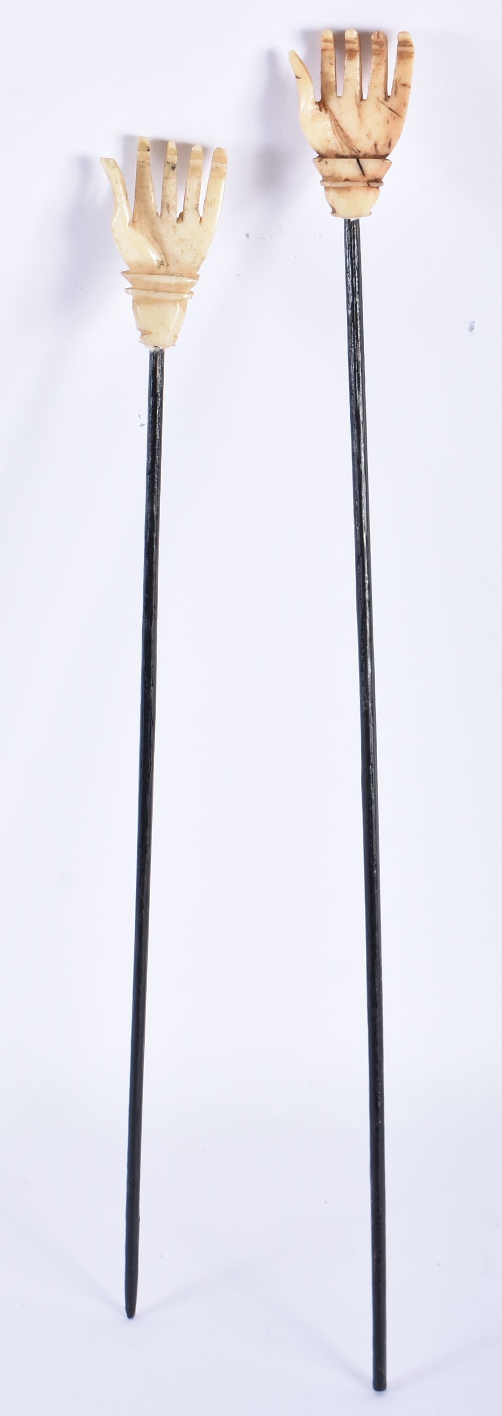 A PAIR OF GEORGE III BONE BACK SCRATCHERS. Largest 30 cm long.: A PAIR OF GEORGE III BONE BACK SCRATCHERS. Largest 30 cm long.