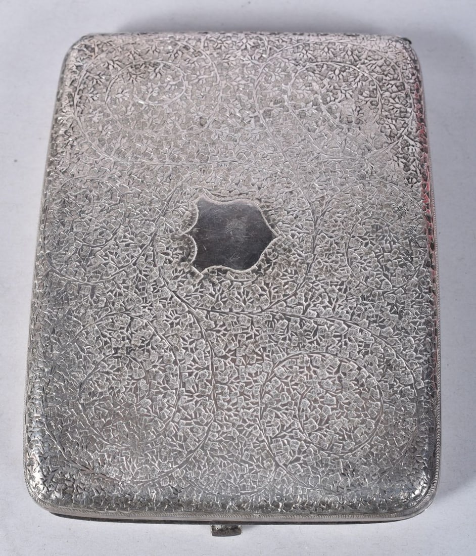 A Middle Eastern Silver Cigarette Case.  10.5cm x 7.9cm x 1.3cm, weight 129.8g (1 of 3)