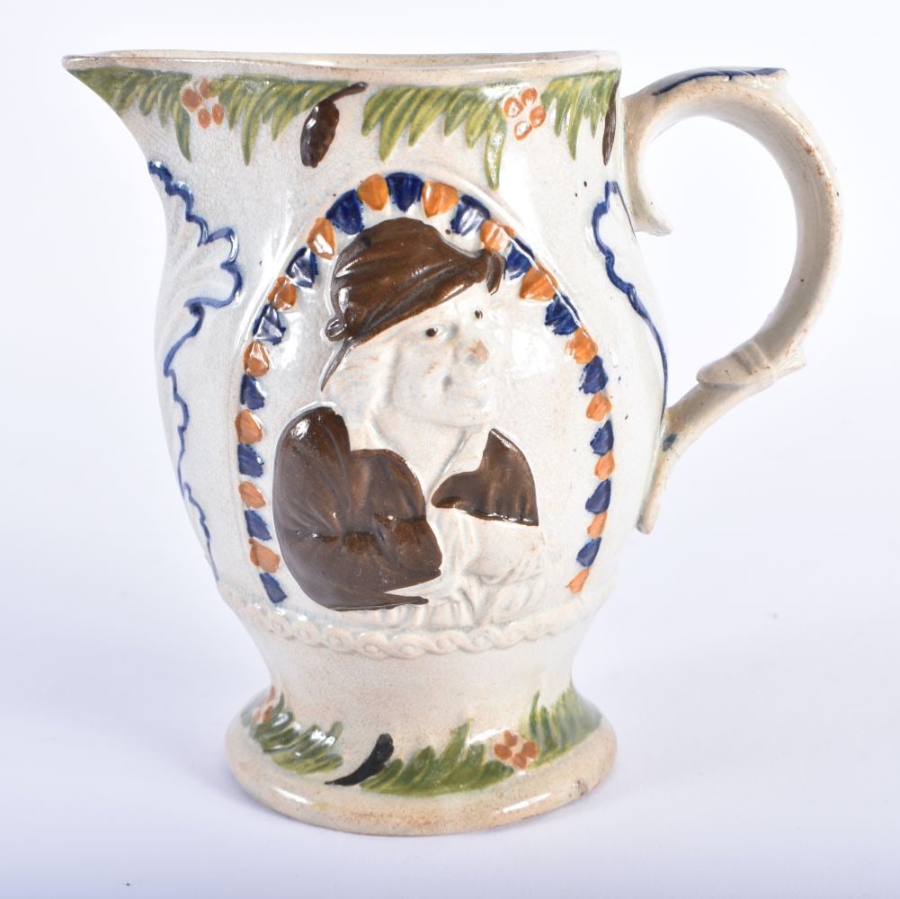 AN EARLY 19TH CENTURY ENGLISH PRATTWARE JUG decorated with portraits. 14 cm high. (1 of 6)
