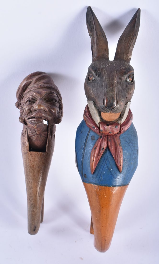 A RARE ANTIQUE PAINTED WOOD TREEN PETER RABBIT NUT CRACKER together with another wood nut cracker. L (1 of 7)