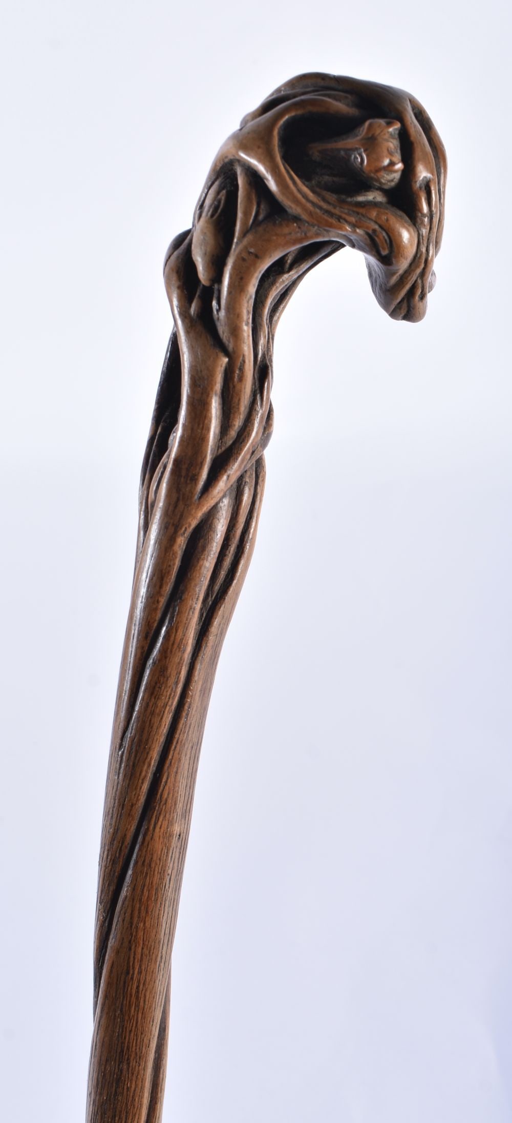 AN EARLY 19TH CENTURY CONTINENTAL CARVED WOOD FOLK ART WALKING CANE formed with a fox hunting rabbit (1 of 5)