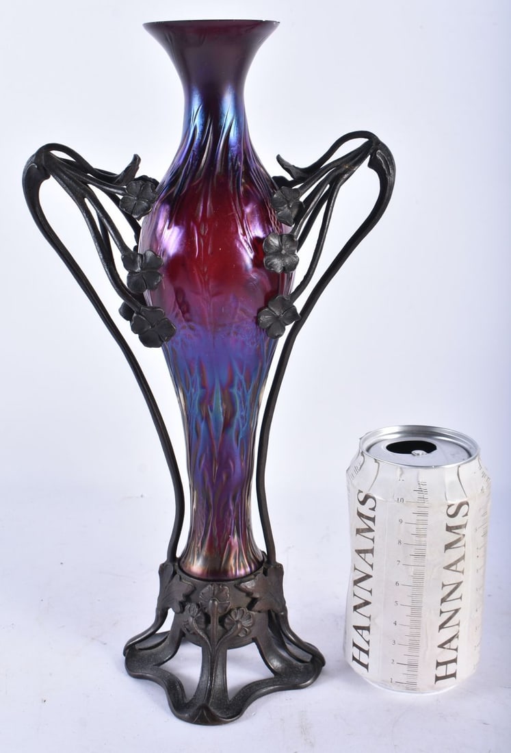 AN ART NOUVEAU LOETZ STYLE VASE within floral scrolling mounts. 31.5 cm high.: AN ART NOUVEAU LOETZ STYLE VASE within floral scrolling mounts. 31.5 cm high.