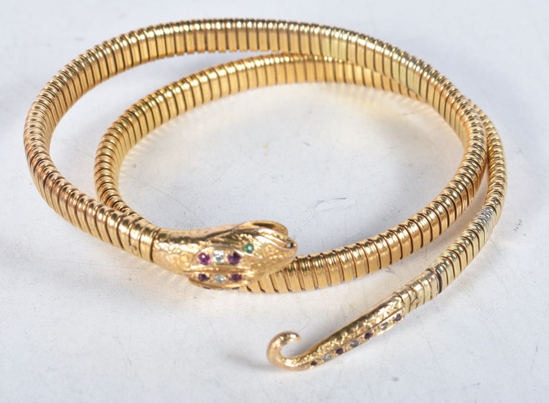 A LOVELY 9CT GOLD SNAKE BANGLE. 34.8 grams. 46 cm long. (1 of 3)