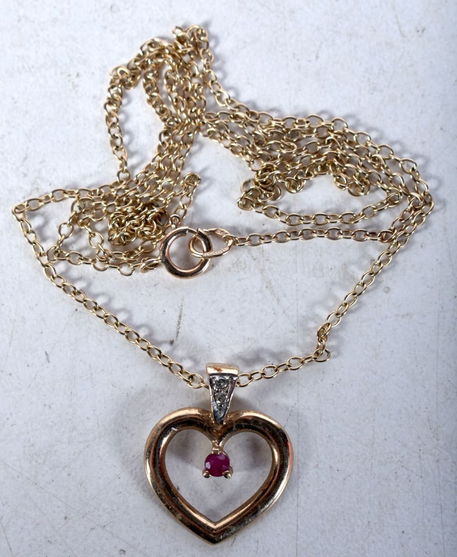 9ct gold ruby & diamond heart shape pendant necklace (2.3g). 48 cm long, pendant 1.75 cm x 1.5 cm. (1 of 2)