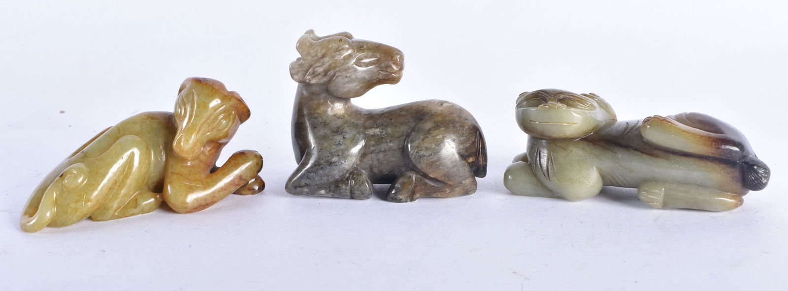 THREE CHINESE MUTTON JADE FIGURES OF BEASTS 20th Century. Largest 8 cm wide. (3) (1 of 8)