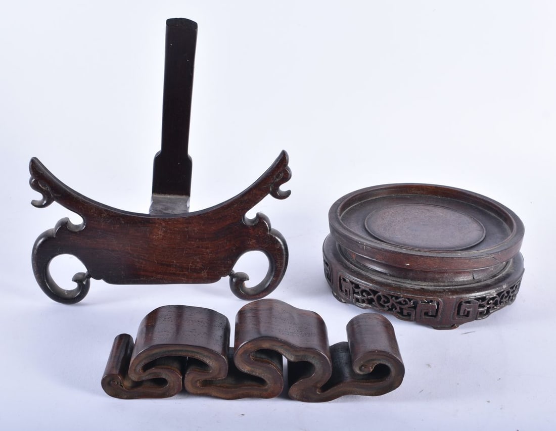 AN UNUSUAL 19TH CENTURY CHINESE CARVED HARDWOOD LINGZHI FUNGUS STAND Qing, together with two others.: AN UNUSUAL 19TH CENTURY CHINESE CARVED HARDWOOD LINGZHI FUNGUS STAND Qing, together with two others. Largest 19 cm wide. (3)