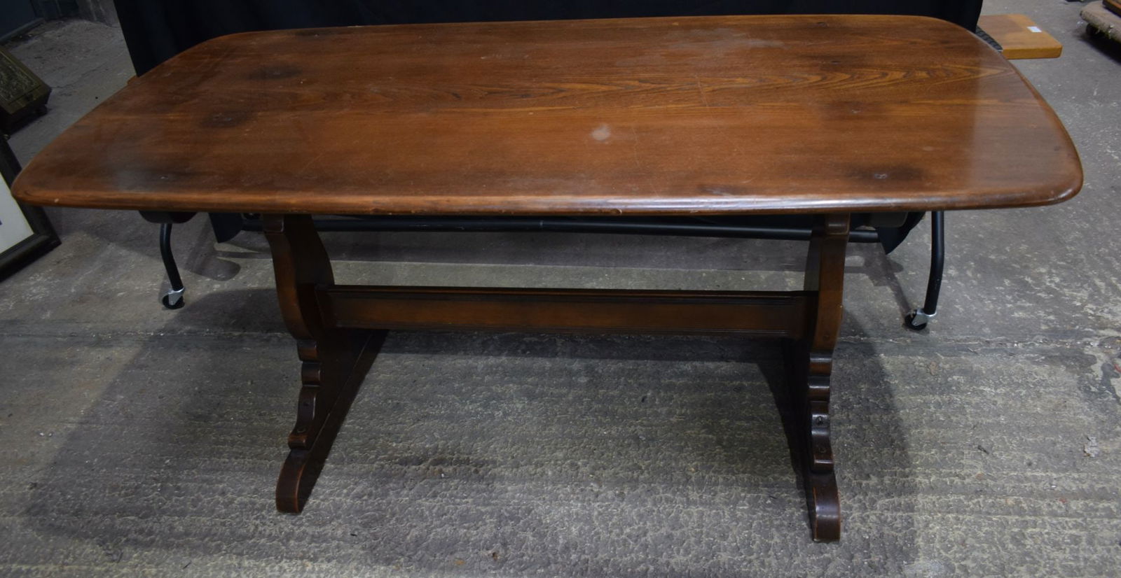 An Ercol dining table 71.5 x 152 x 76cm.: An Ercol dining table 71.5 x 152 x 76cm.