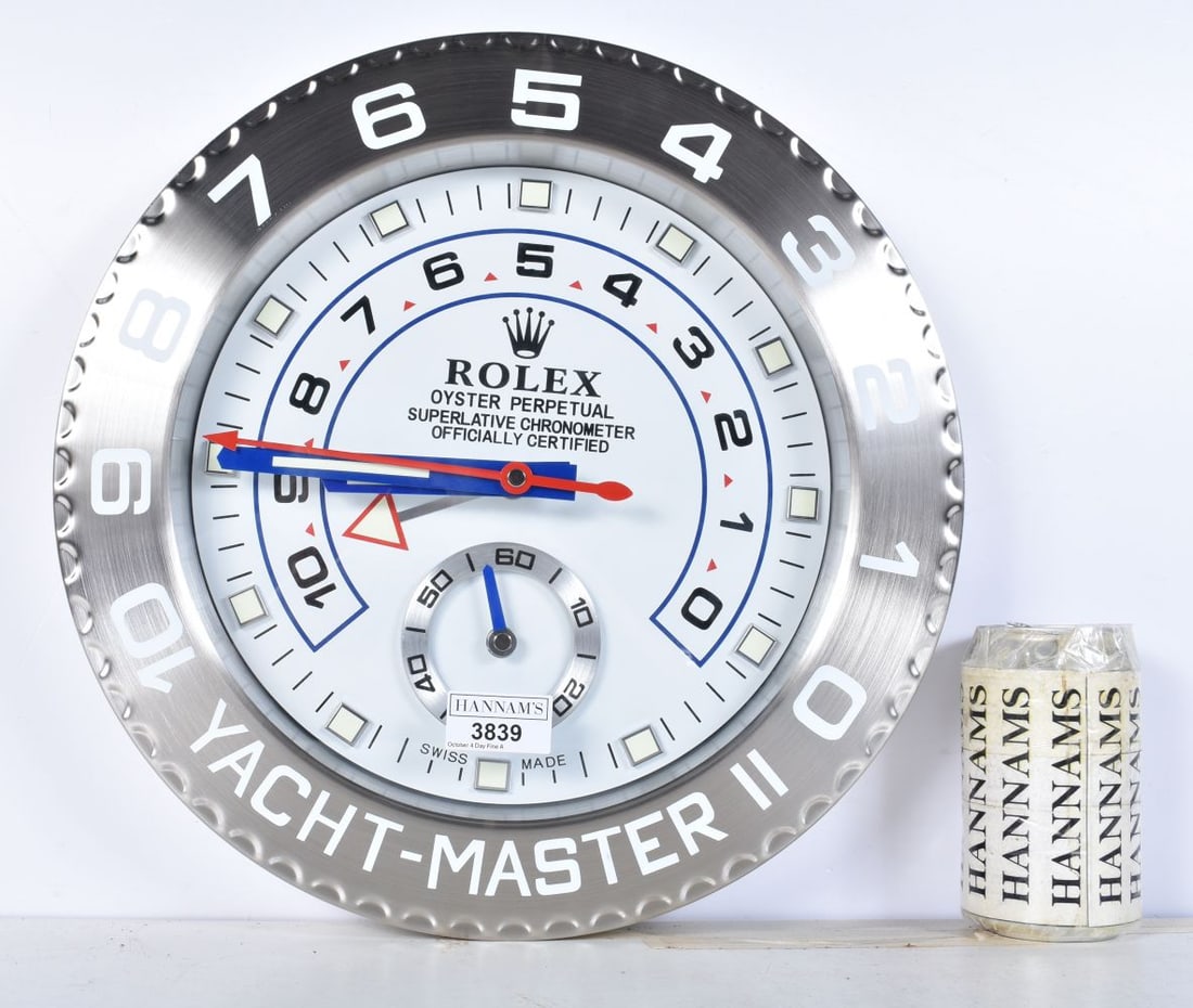 A Contemporary Rolex style dealership clock 33 cm. (1 of 2)