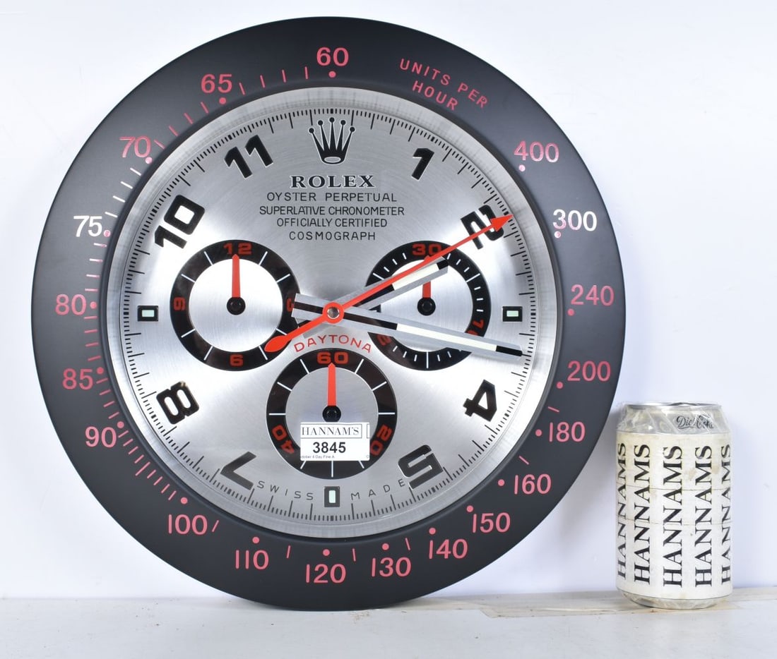 A Contemporary Rolex style dealership clock 33 cm.: A Contemporary Rolex style dealership clock 33 cm.