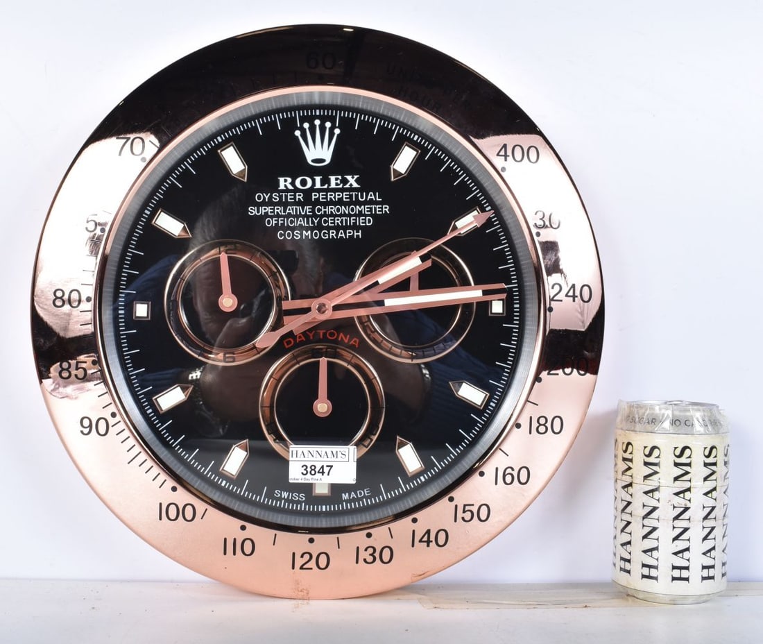 A Contemporary Rolex style dealership clock 33 cm.: A Contemporary Rolex style dealership clock 33 cm.