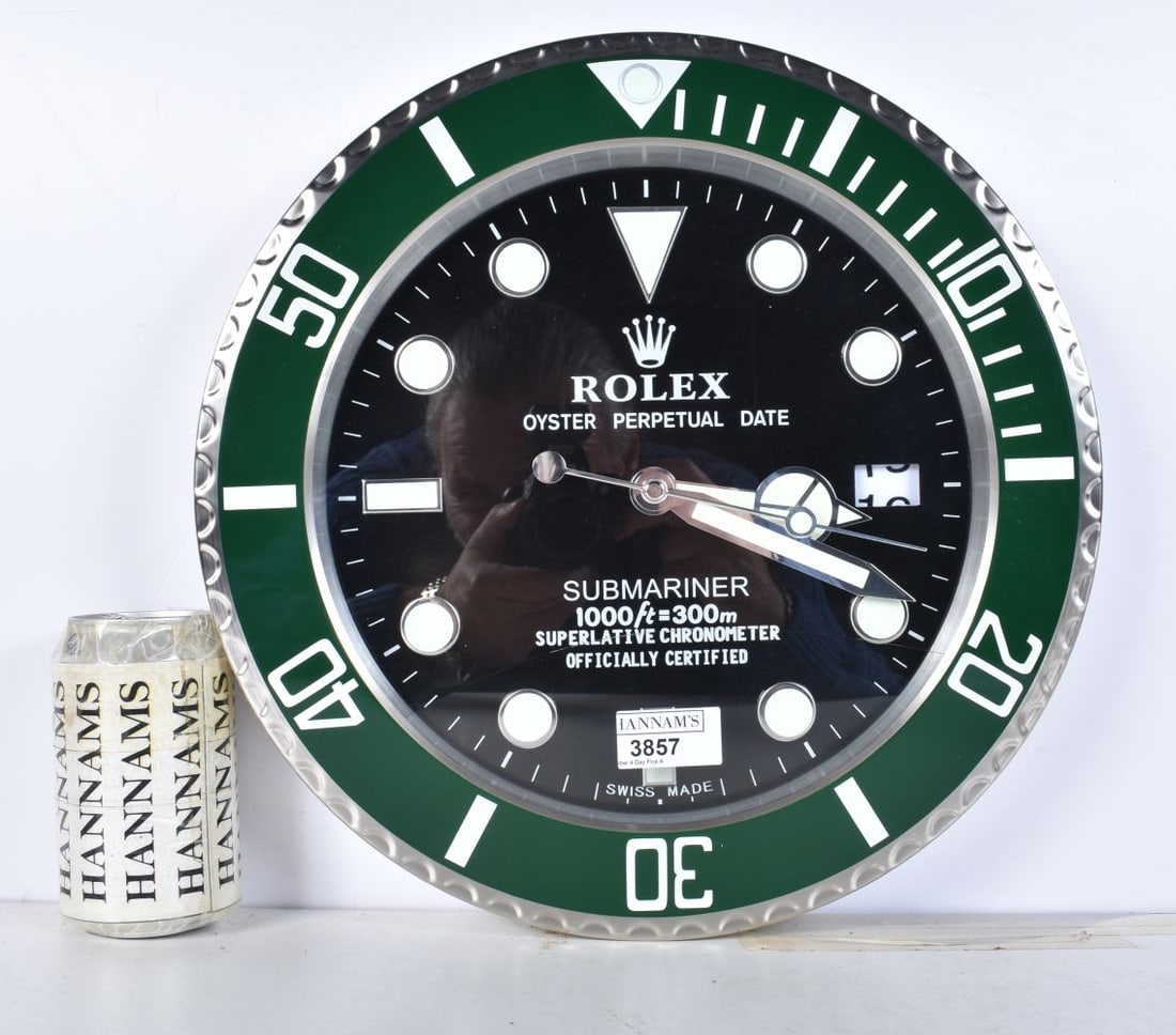 A Contemporary Rolex style dealership clock 33 cm.: A Contemporary Rolex style dealership clock 33 cm.