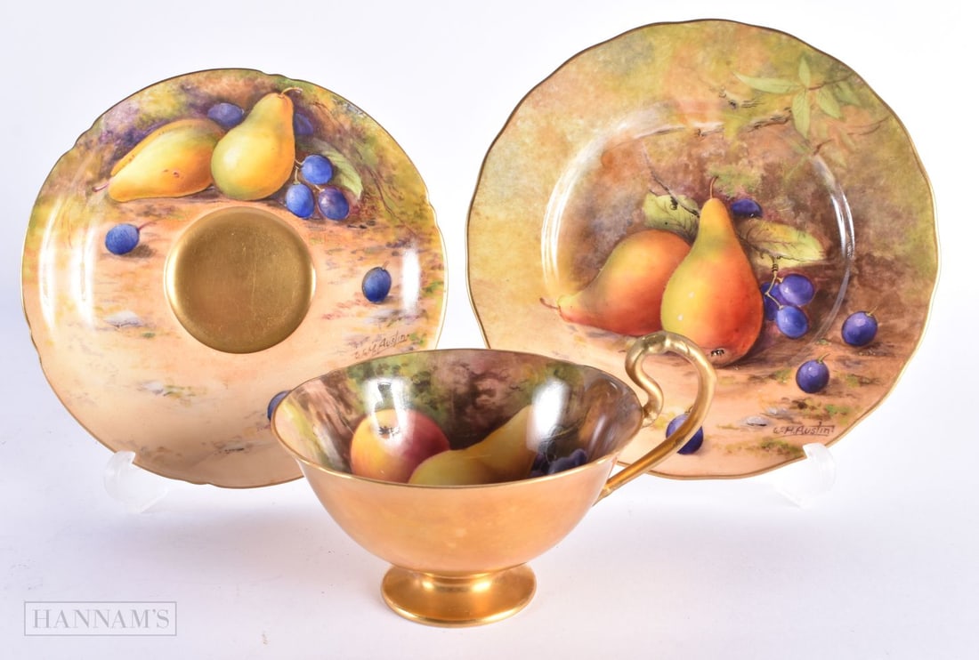 A ROYAL WORCESTER FRUIT PAINTED PORCELAIN TRIO by W H Austin & Price. (3) (1 of 11)