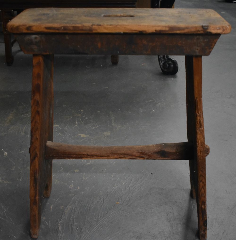 AN ANTIQUE CARVED WOOD RUSTIC STOOL. 58 cm x 50 cm. (1 of 5)