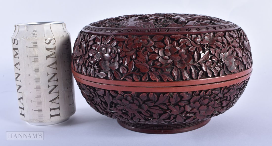 A LARGE 19TH CENTURY CHINESE CARVED CINNABAR LACQUER BOX AND COVER Qing, decorated with figures and (1 of 6)