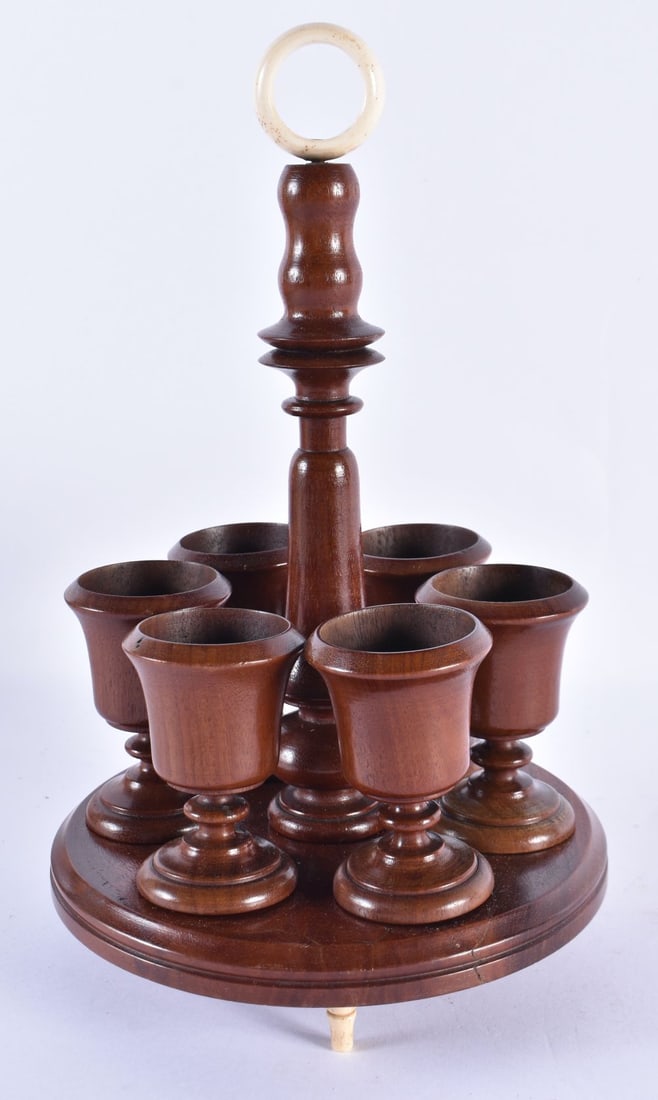 AN EDWARDIAN MAHOGANY EGG SERVING STAND. 28 cm high. (1 of 4)