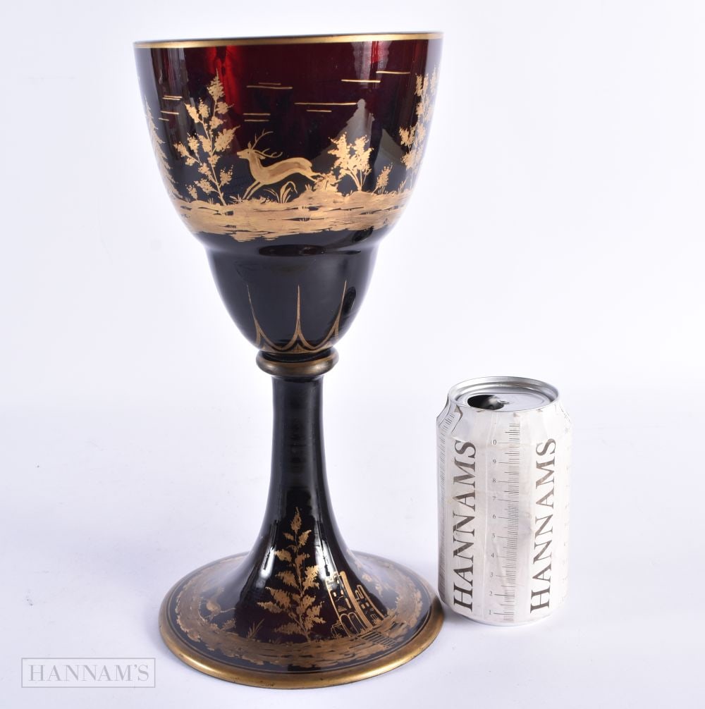 A LARGE 19TH CENTURY BOHEMIAN RUBY RED GLASS VASE painted in gilt with hunting scenes within landsca (1 of 5)