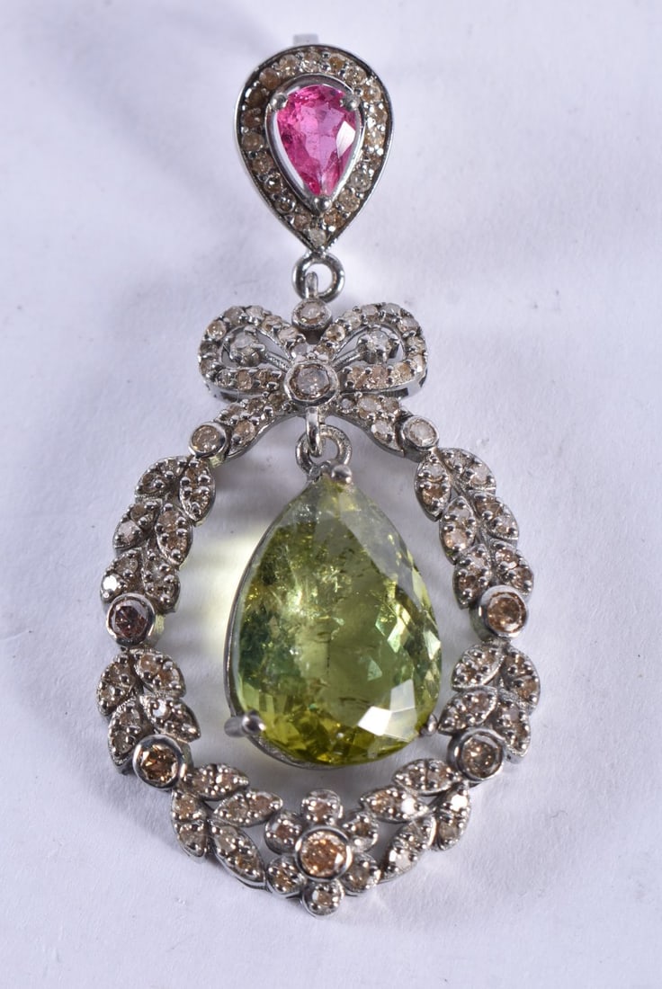 A DIAMOND PERIDOT AND RUBY PENDANT. 6.4 grams. 4.75 cm x 2.25 cm. (1 of 3)