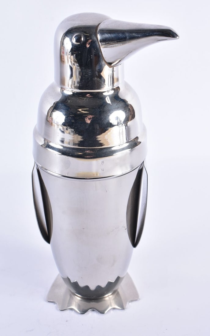 A PENGUIN SILVER PLATED COCKTAIL SHAKER AND COVER. 27 cm high. (1 of 3)