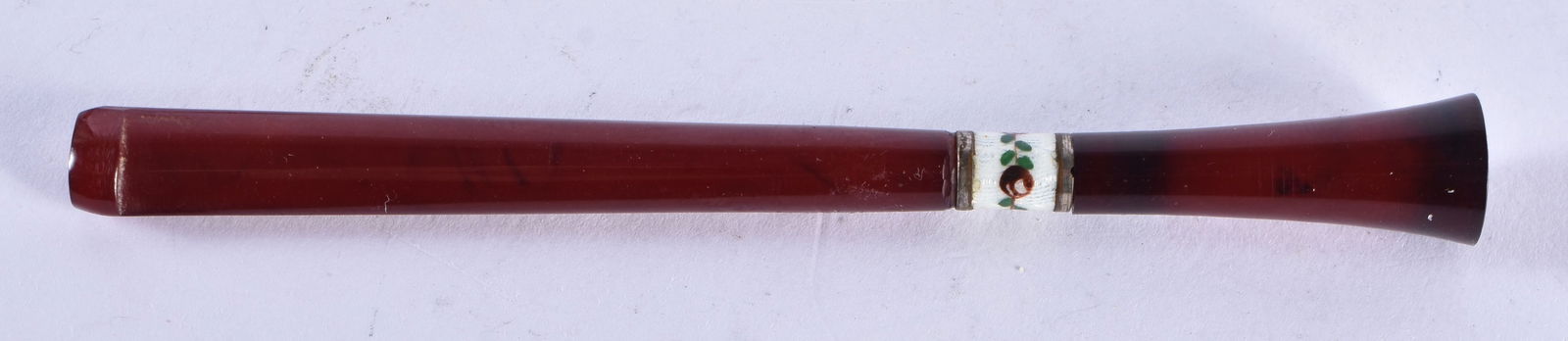 AN ART DECO CHERRY AMBER BAKELITE CHEROOT HOLDER with enamelled mounts. 6.5 grams. 12 cm long. (1 of 3)