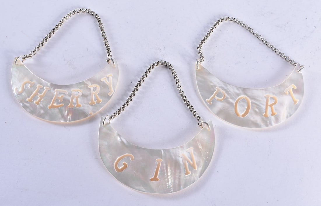 THREE SILVER AND MOTHER OF PEARL DECANTER LABELS. 52 grams. 9.25 cm x 7.25 cm. (3) (1 of 2)