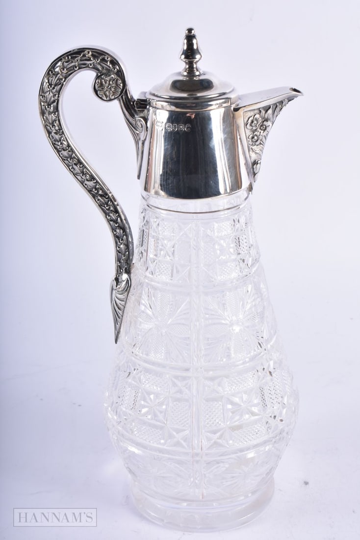 A VICTORIAN SILVER AND CUT GLASS CLARET JUG. 28 cm high. (1 of 4)