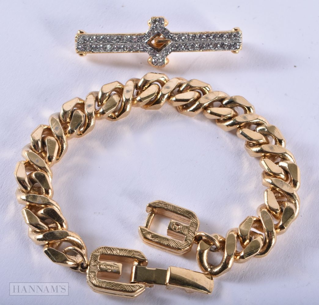 Collection of Givenchy Gold Tone Jewellery inc. Bracelet, Brooch. Stamped Givenchy. Bracelet 20cm: Collection of Givenchy Gold Tone Jewellery inc. Bracelet, Brooch. Stamped Givenchy. Bracelet 20cm long, total weight 47.7g (2)