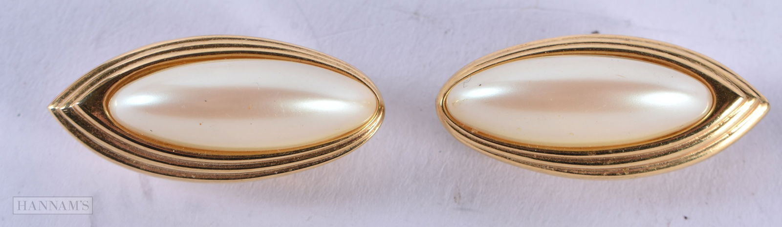 Pair of Givenchy Gold Tone Clip On Earrings w/ Simulated Pearl Cabuchons. Stamped Givenchy. 3.4cm: Pair of Givenchy Gold Tone Clip On Earrings w/ Simulated Pearl Cabuchons. Stamped Givenchy. 3.4cm x 1.5cm, total weight 15.6g