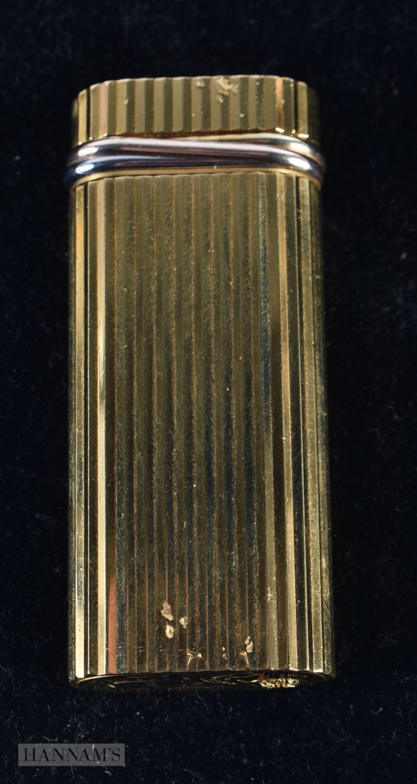 A Gold Plated Cartier Lighter.  5.9cm x 2.6cm x 1.3cm not tested (1 of 3)