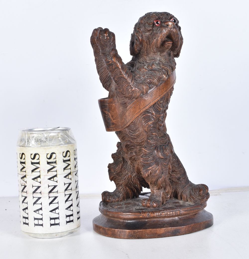 A carved Black Forest dog 24cm . (1 of 6)