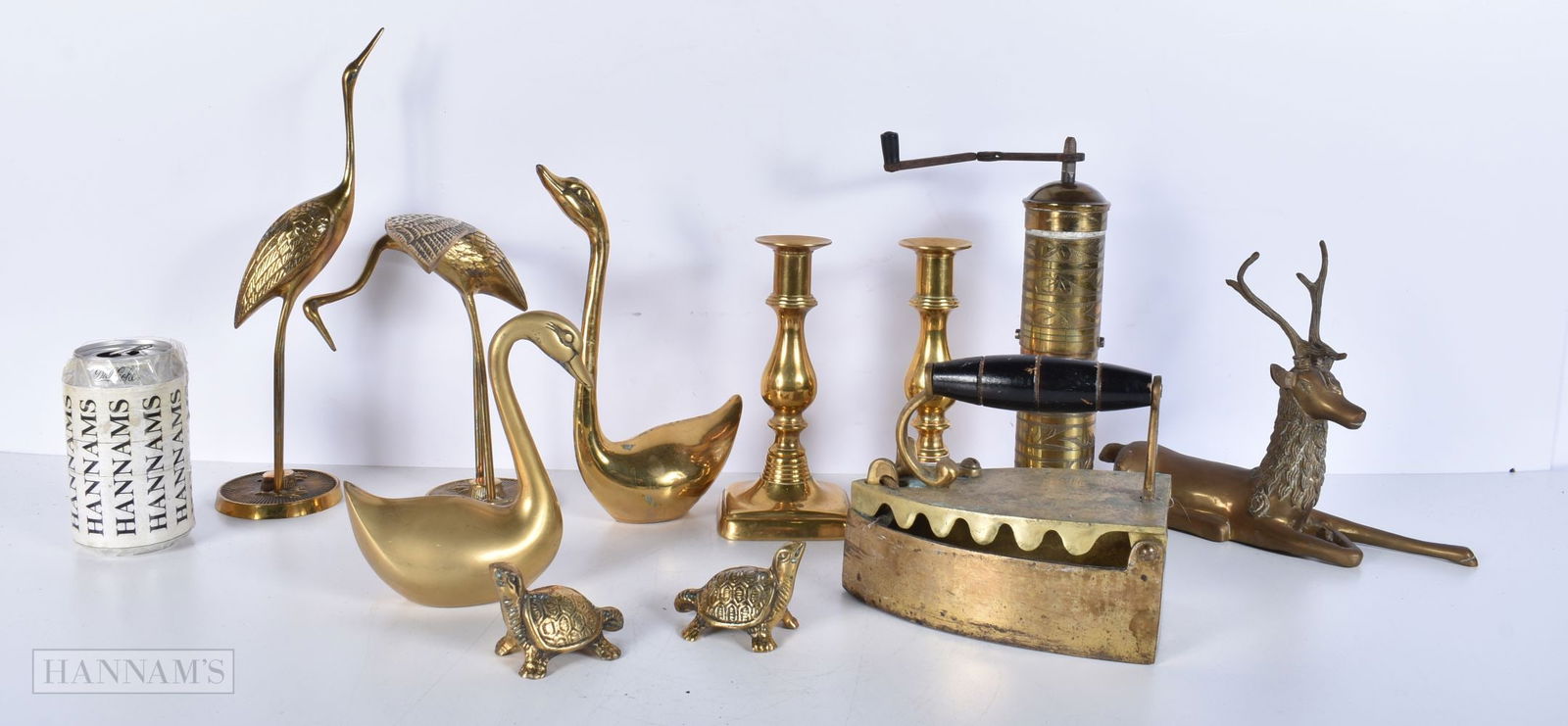 A collection of vintage brass items , candle sticks ,coffee grinder, iron, animal, birds 32 cm (11). (1 of 7)