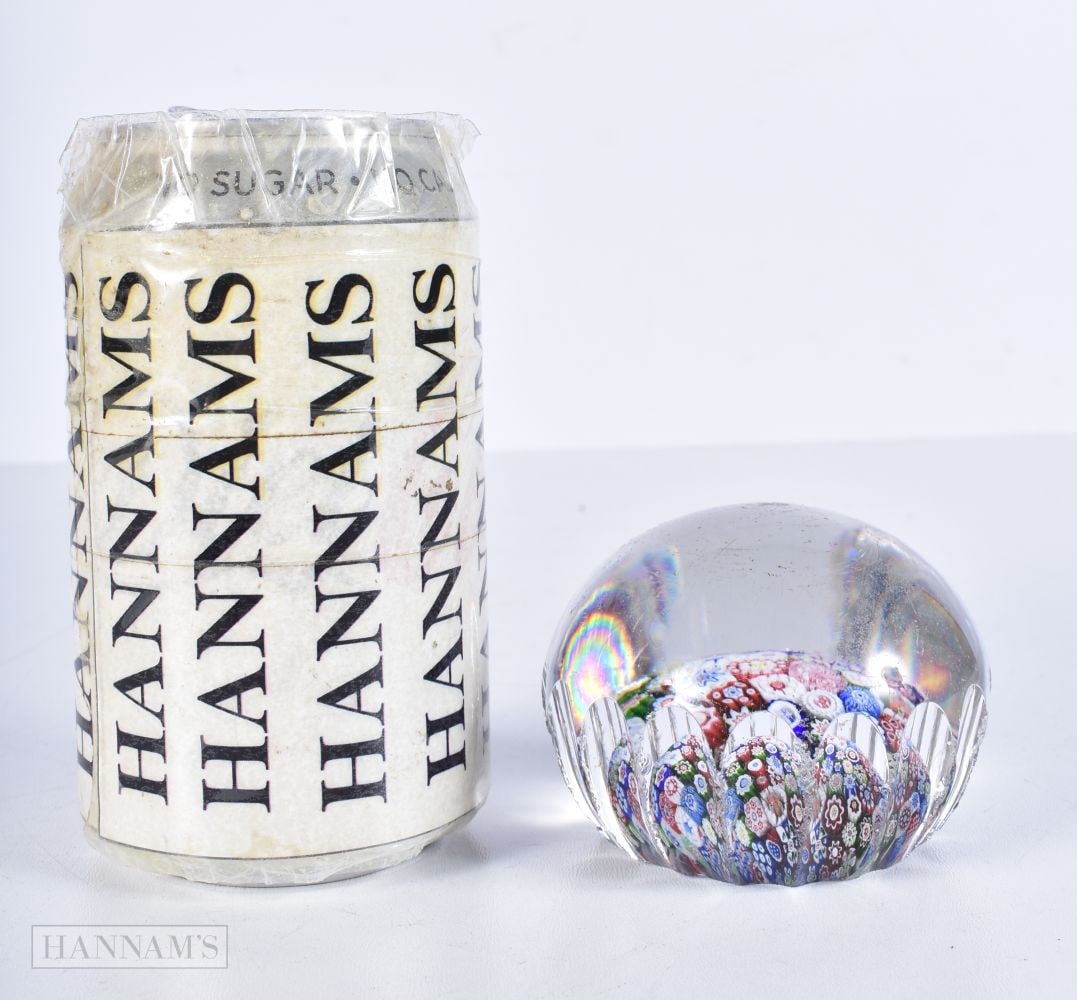 A Millefiori paperweight with a faceted side possibly Baccarat 4.5cm: A Millefiori paperweight with a faceted side possibly Baccarat 4.5cm