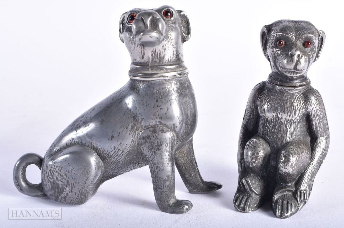 TWO EARLY VICTORIAN NOVELTY PEWTER DESK SANDERS with glass eyes, modelled as a dog and a monkey. Lar (1 of 7)