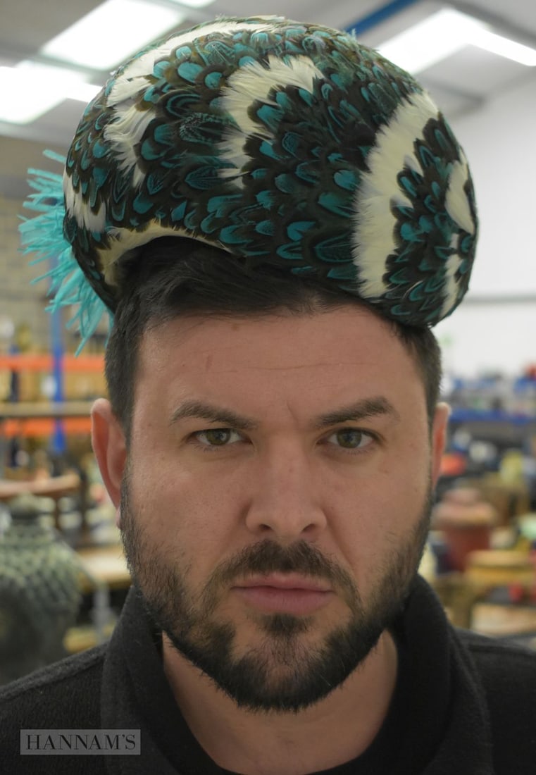 A FEATHER JOHN LEWIS HAT together with a dinner service. (qty): A FEATHER JOHN LEWIS HAT together with a dinner service. (qty)