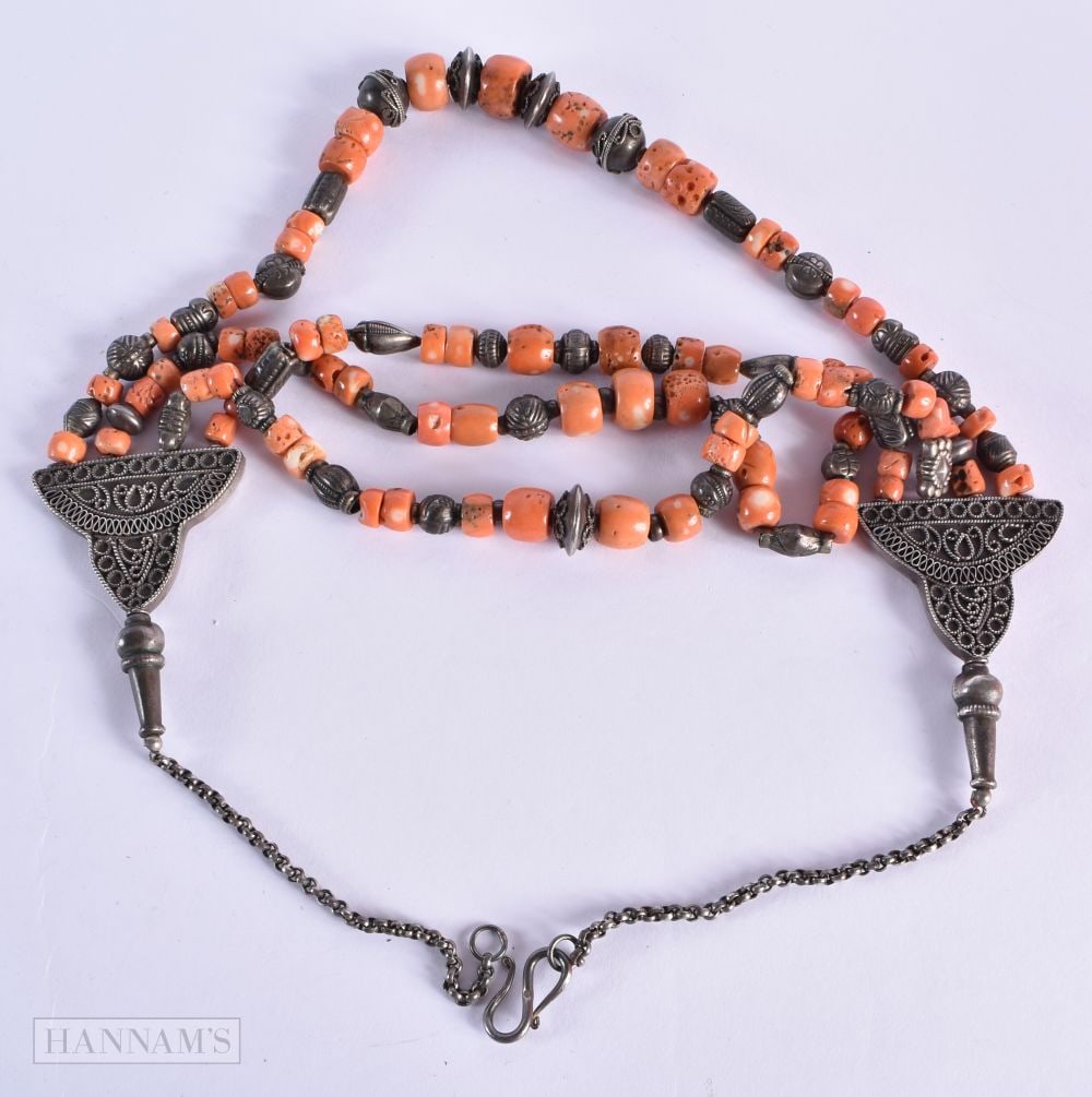 A LARGE ANTIQUE MIDDLE EASTERN SILVER AND CORAL TRIBAL NECKLACE. 163 grams. 54 cm long. (1 of 4)