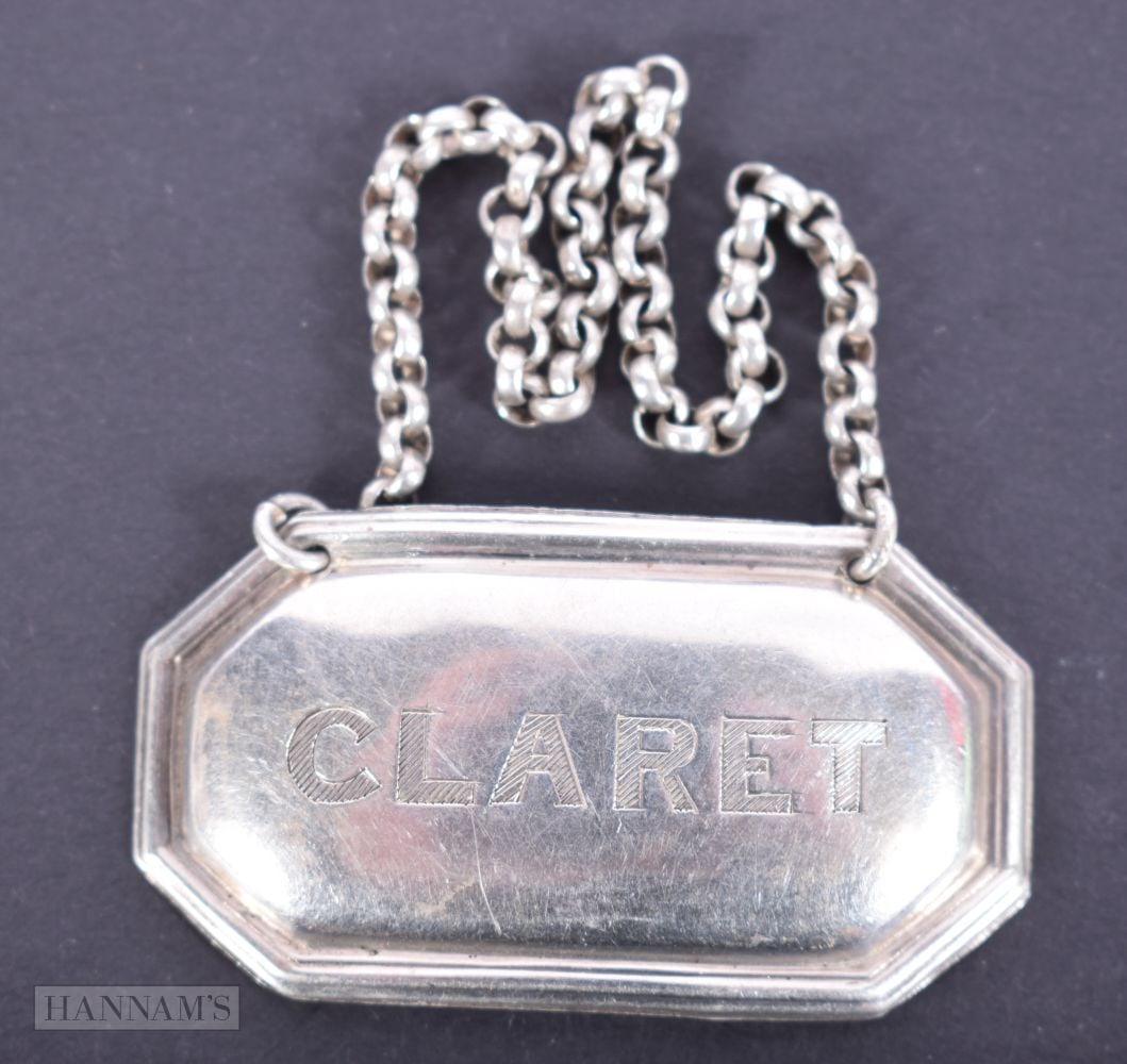 A Victorian Silver Claret Decanter Label.  Hallmarked Birmingham 1887.  5.1cm x 2.8 cm, weight 11.8g (1 of 3)
