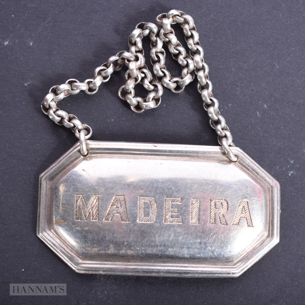 A Victorian Silver Madeira Decanter Label by Henry Manton hallmarked Birmingham 1887.  5.2cm x 2.8 c (1 of 3)