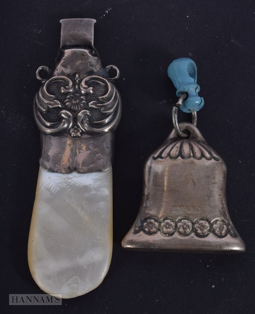 A Silver Babies Rattle and a Silver Handled Teether with Whistle.  Stamped Sterling.  Teether 8.3cm (1 of 2)