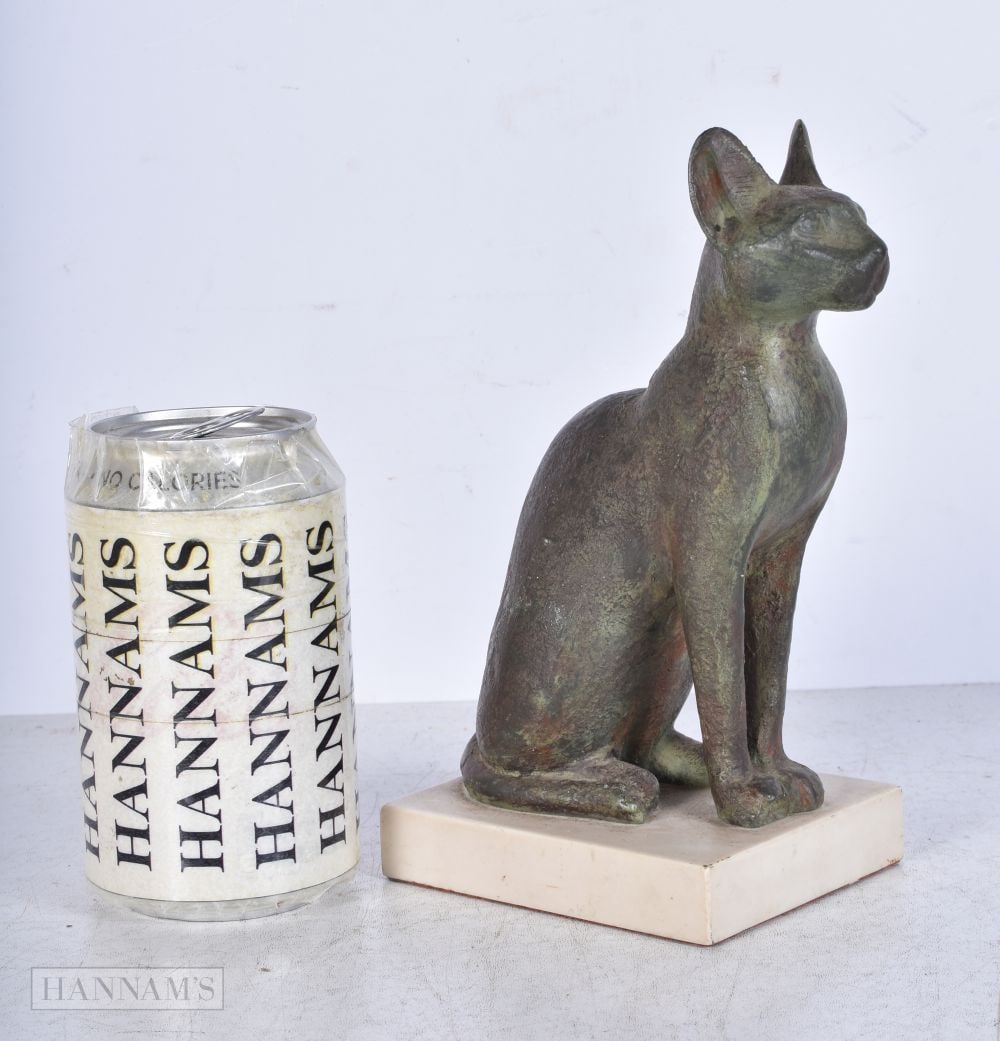 A Museum copy bronzed Egyptian cat 16.5cm.: A Museum copy bronzed Egyptian cat 16.5cm.