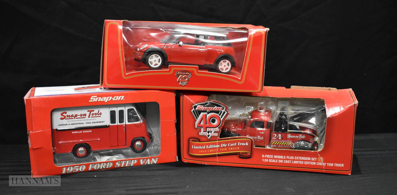 A Collection of boxed Snap on model vehicles 1950 Ford step van ,2001 Mini Cooper & Chevy tow truck: A Collection of boxed Snap on model vehicles 1950 Ford step van ,2001 Mini Cooper & Chevy tow truck 13 x 30cm (Qty)