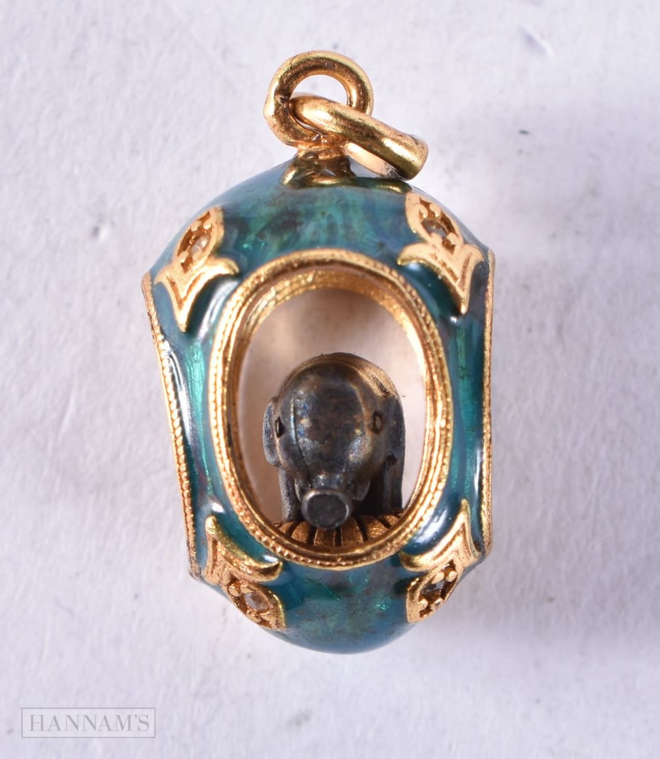 A CONTINENTAL SILVER AND ENAMEL EGG PENDANT. 8.2 grams. 2.25 cm x 1.5 cm. (1 of 4)