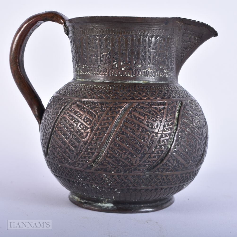 AN 18TH/19TH CENTURY ISLAMIC PERSIAN COPPER ALLOY EWER decorated with scripture. 14 cm x 14 cm. (1 of 4)