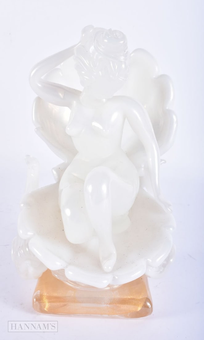 AN UNUSUAL ITALIAN PEARL AND GILT GLASS FIGURE OF A FEMALE modelled emerging from a clam shell. 22 c: AN UNUSUAL ITALIAN PEARL AND GILT GLASS FIGURE OF A FEMALE modelled emerging from a clam shell. 22 cm x 10 cm.