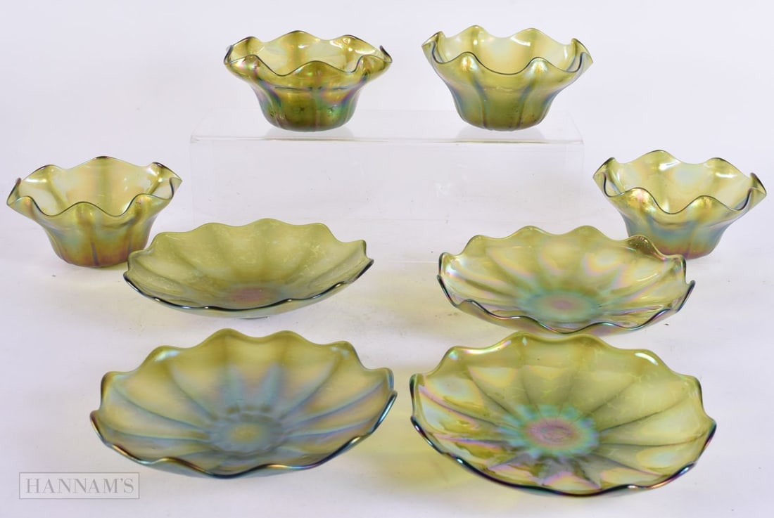 A SET OF FOUR ART NOUVEAU LOETZ GLASS BOWLS ON STANDS. Largest 18 cm wide. (8): A SET OF FOUR ART NOUVEAU LOETZ GLASS BOWLS ON STANDS. Largest 18 cm wide. (8)