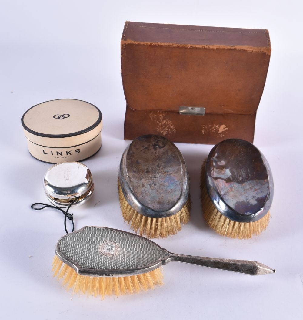 THREE SILVER MOUNTED BRUSHES together with a links of London Yoyo. 326 grams overall. Largest 21 cm (1 of 6)